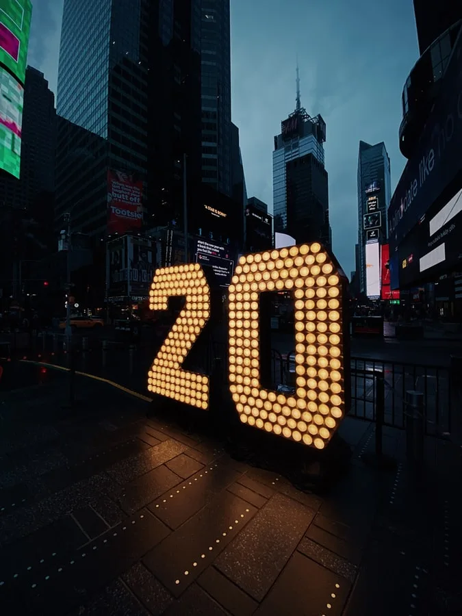 new year 2020 celebration with fireworks and confetti