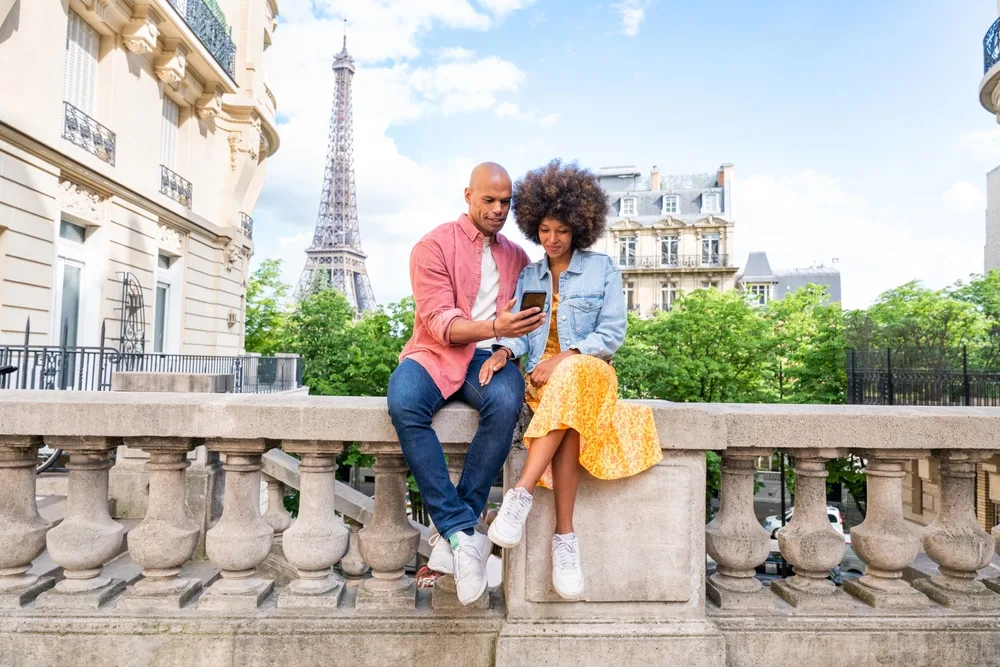 black couple in love visiting paris city centre