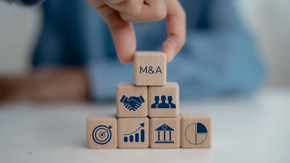business mergers and acquisitions concept with share and asset acquisition blocks