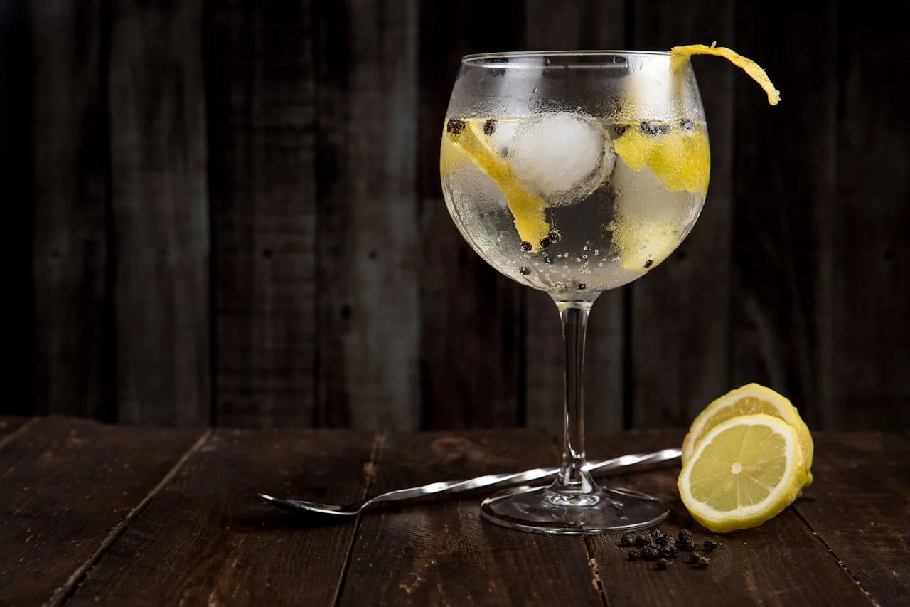 a refreshing cocktail with ice and garnish