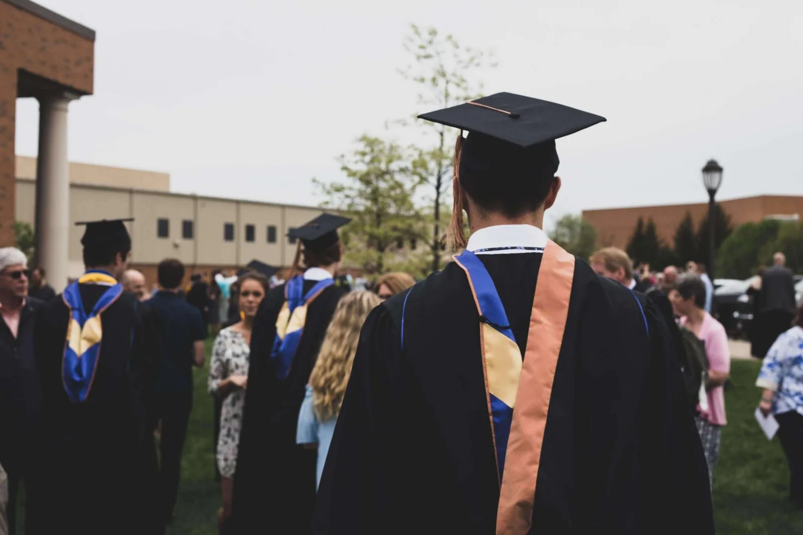 students walking on a college campus