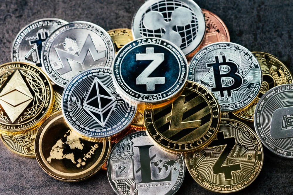 shiny silver and golden cryptocurrency background with various coins