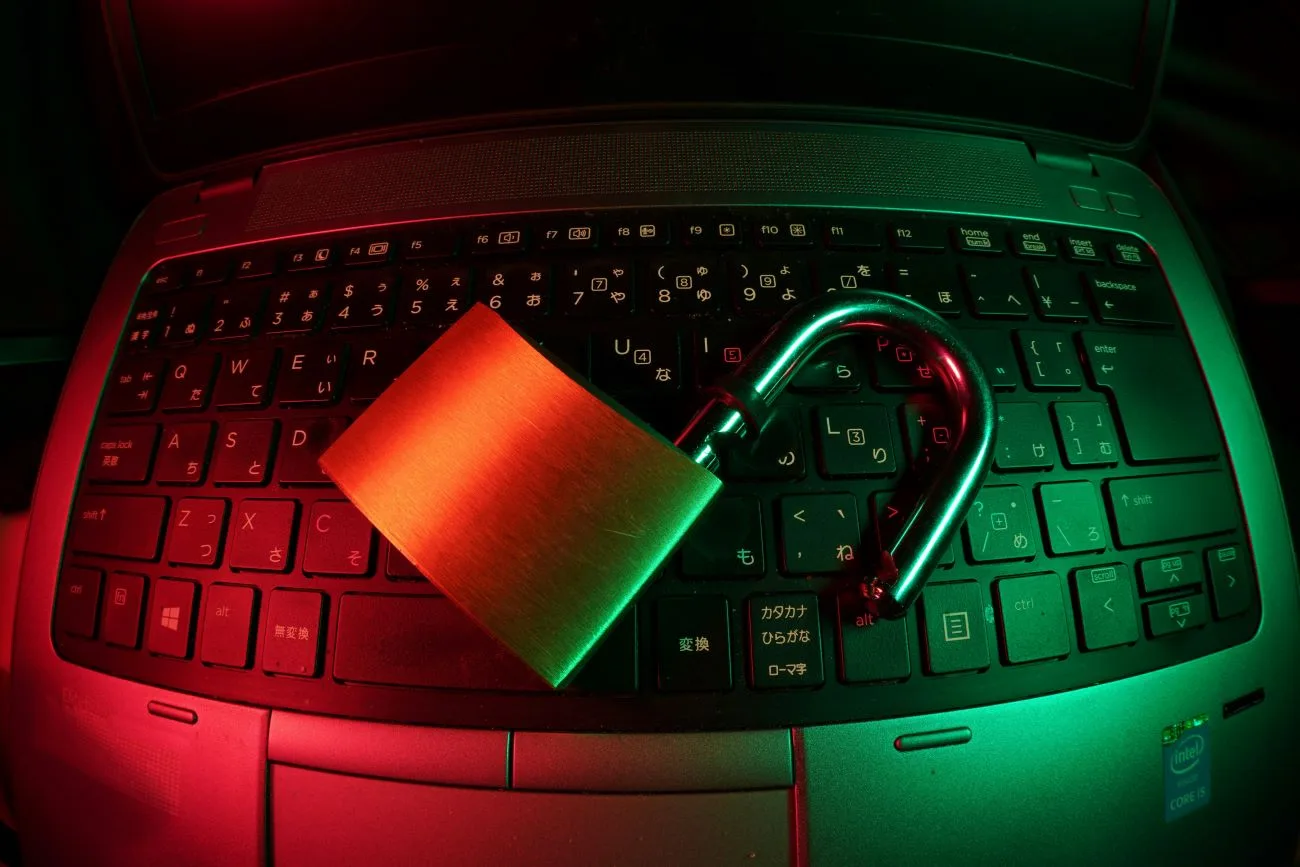 abstract illustration of a digital cyber threat with glowing circuit patterns