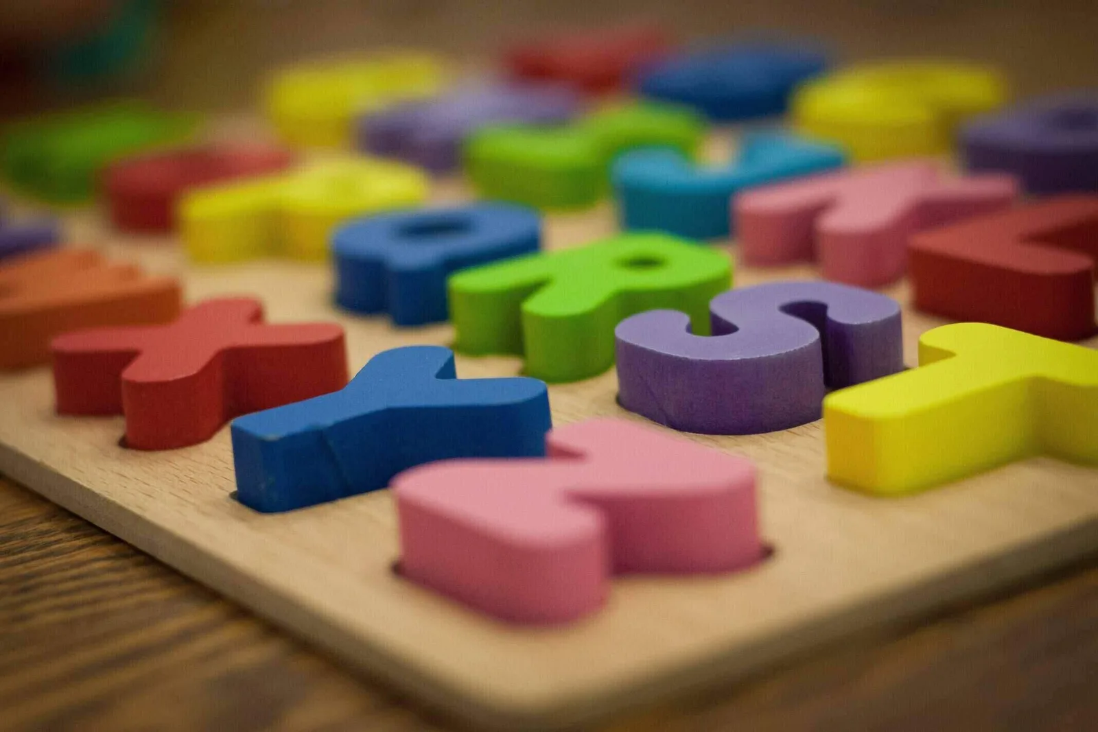 children playing with colorful educational toys learning and developing skills