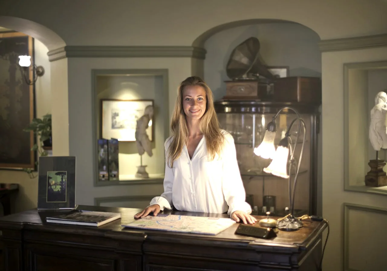 hotel concierge desk assisting guests with travel information and recommendations