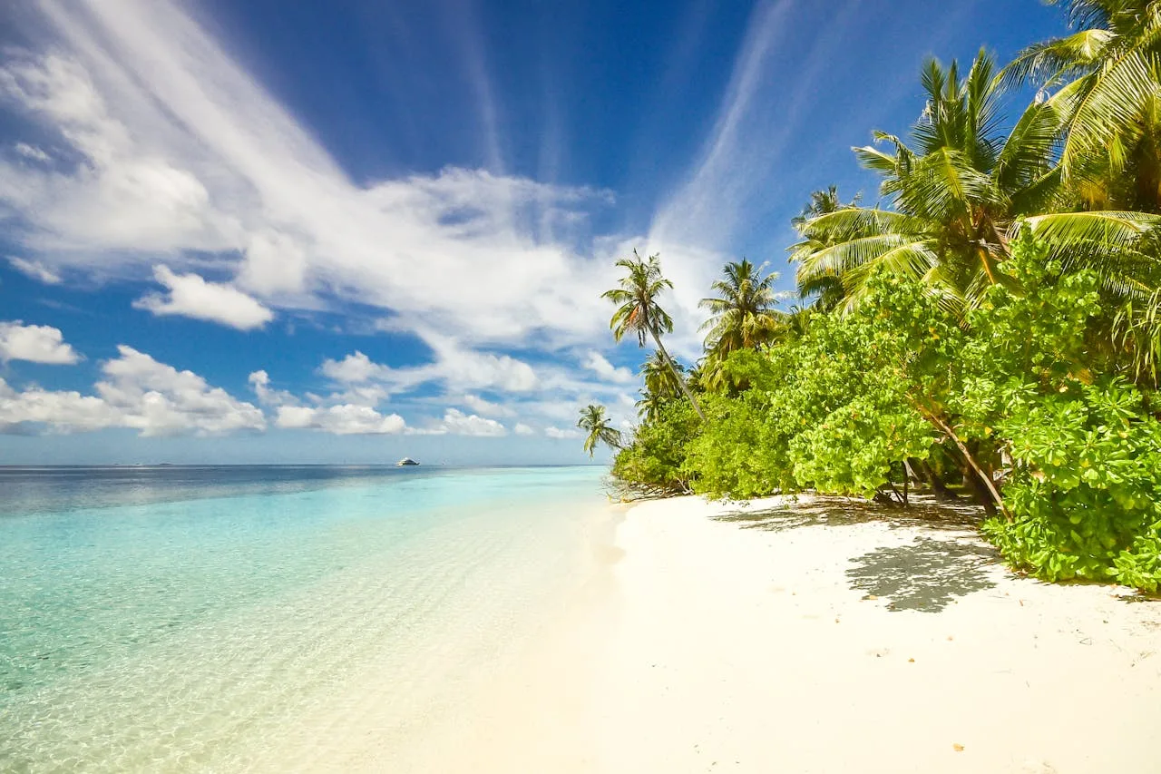 beautiful maldives island with turquoise water and white sand beach