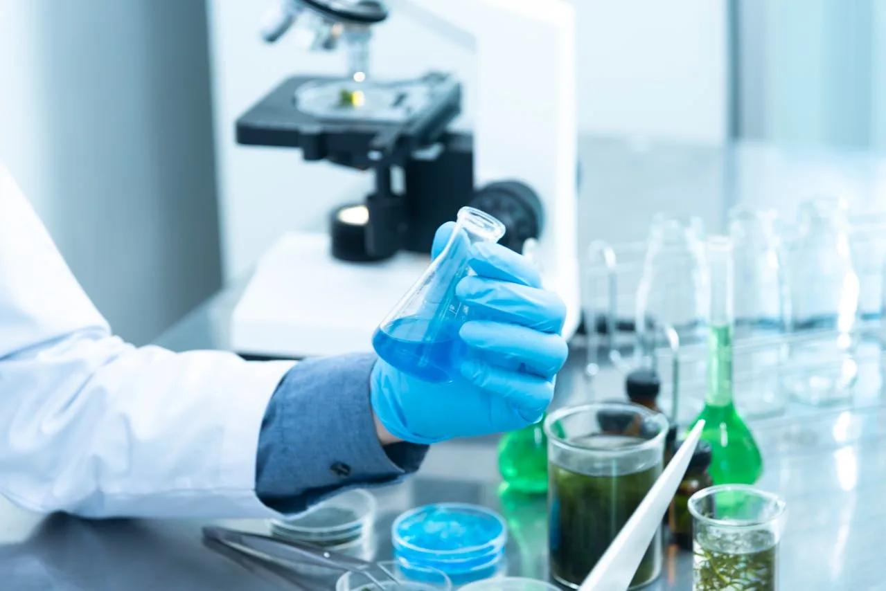 medical research team analyzing data and conducting experiments in a lab