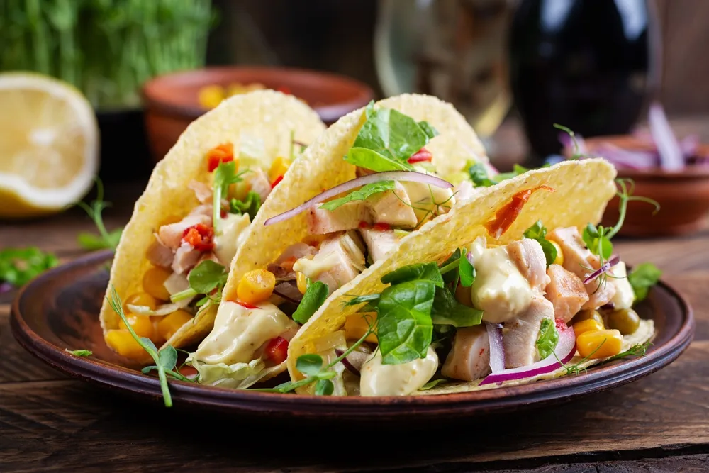 healthy mexican chicken tacos with corn and salsa