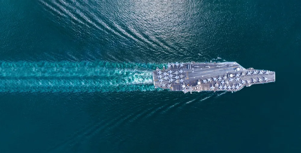 nuclear aircraft carrier fully loaded with fighter jets
