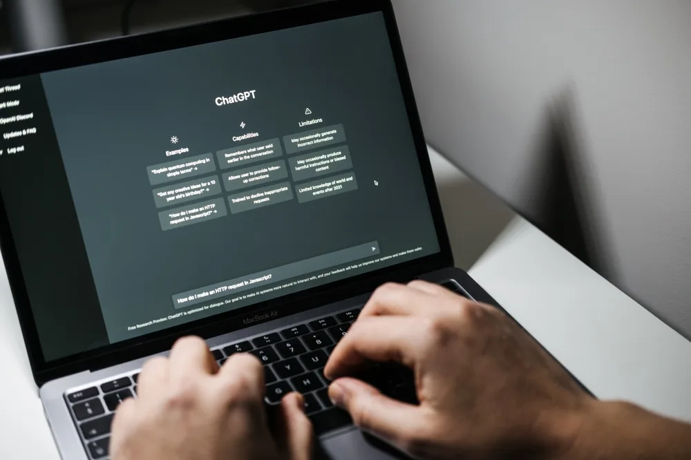 man chatting with artificial intelligence on a computer screen