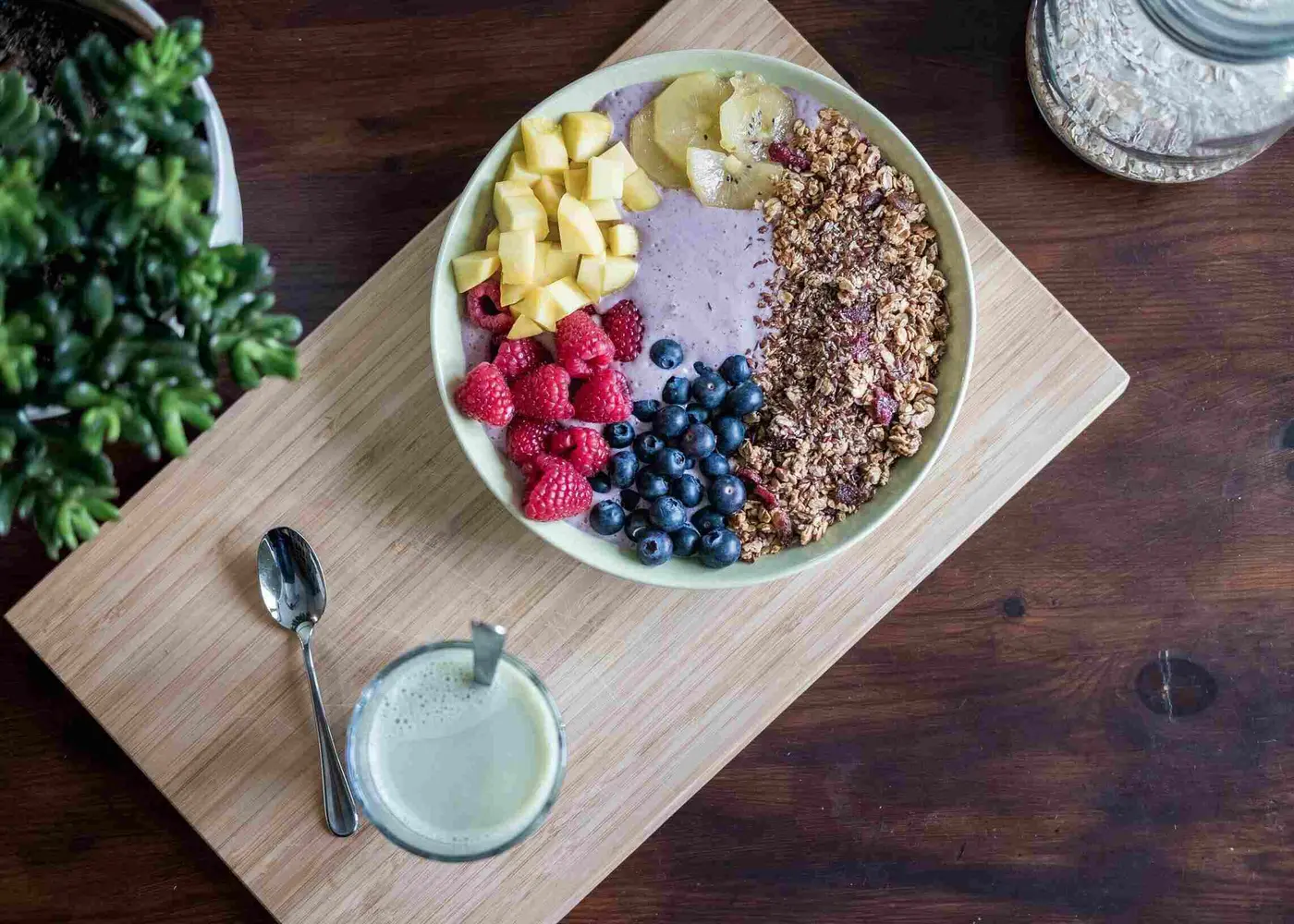 colorful assortment of healthy superfoods like berries and nuts
