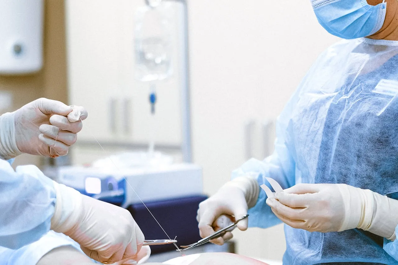 close up of surgical stitches on skin after a procedure