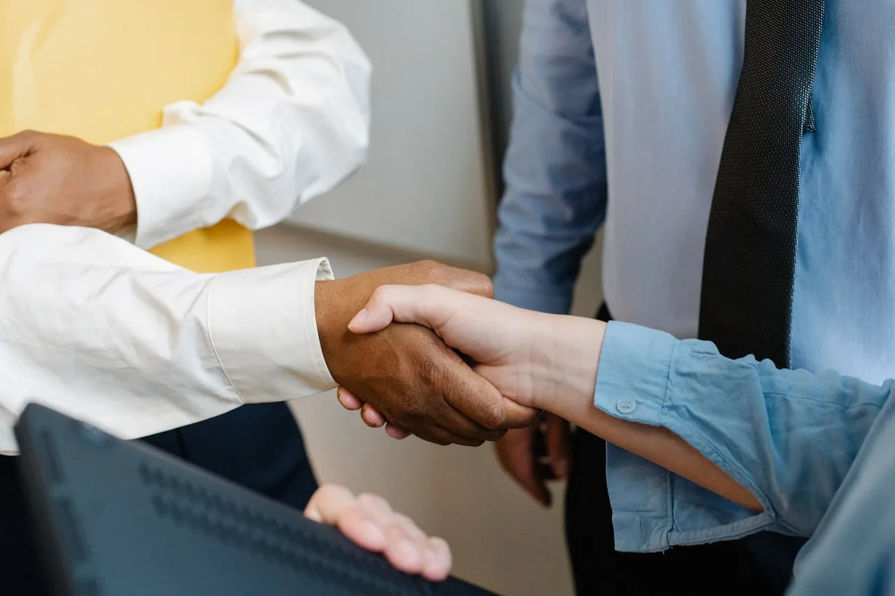 trust handshake between two business people sealing a deal