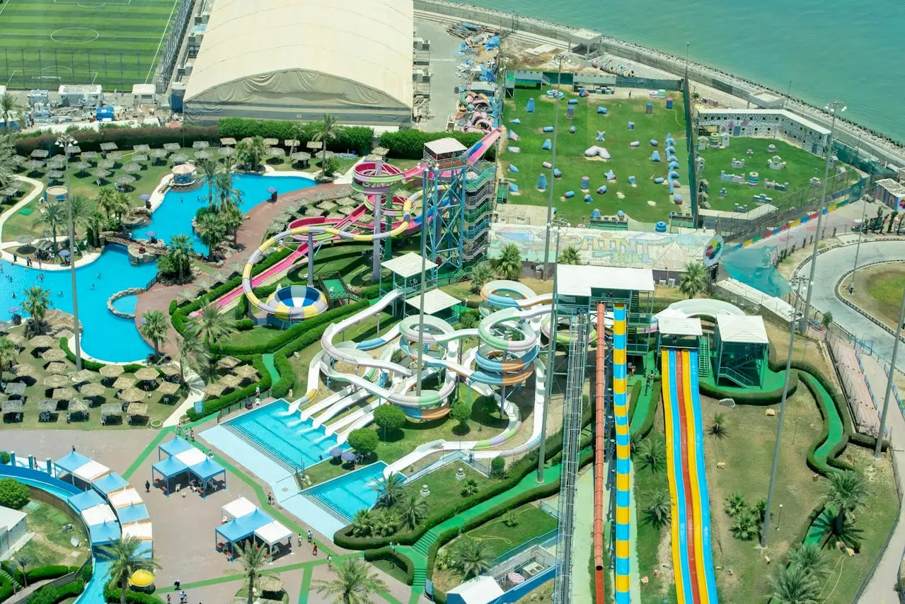 people enjoying a sunny day at a fun water park