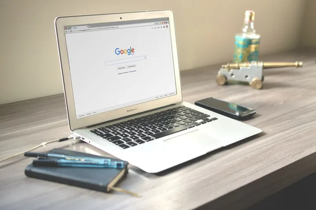 online reputation management explained with a person looking at a laptop