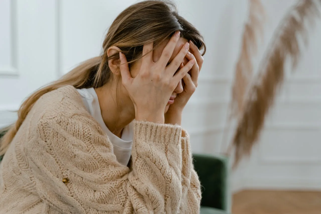 woman looking stressed and frustrated during a crisis
